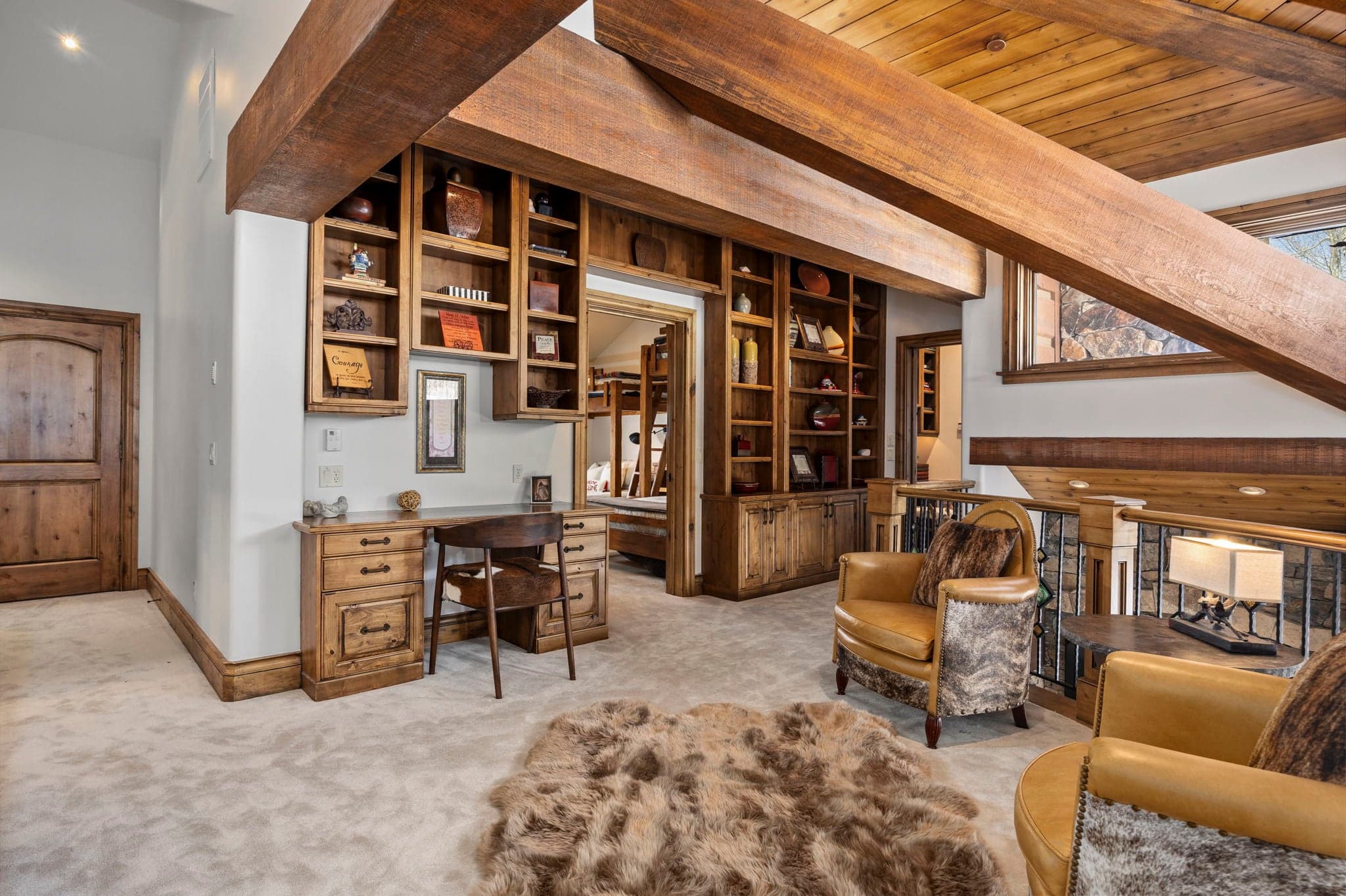 View of upstairs seating area and library