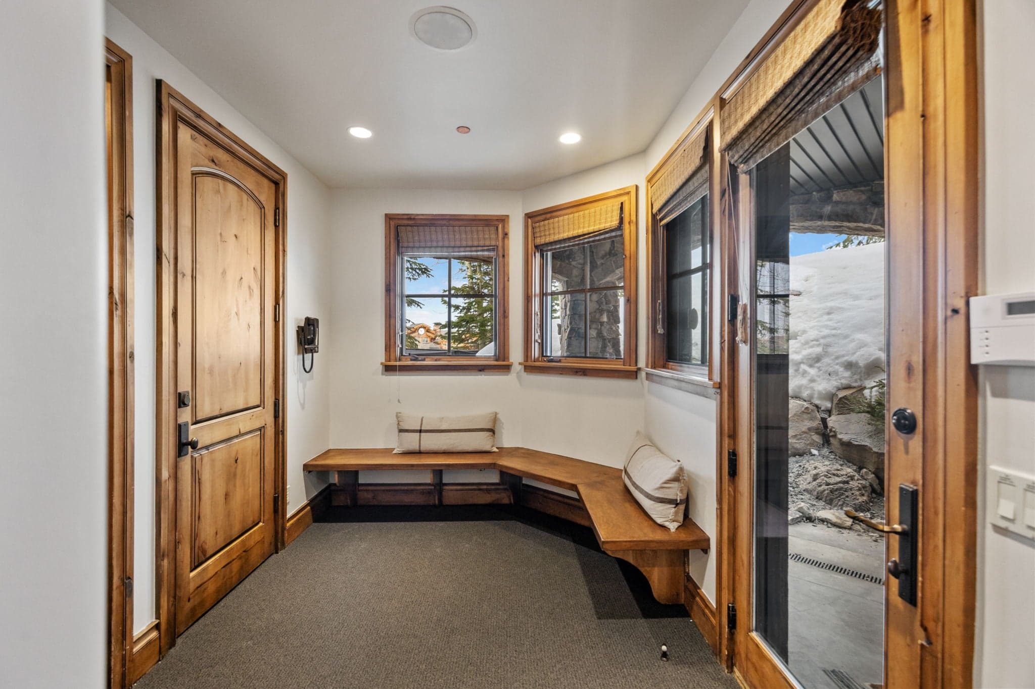 ski gear room with outdoor views