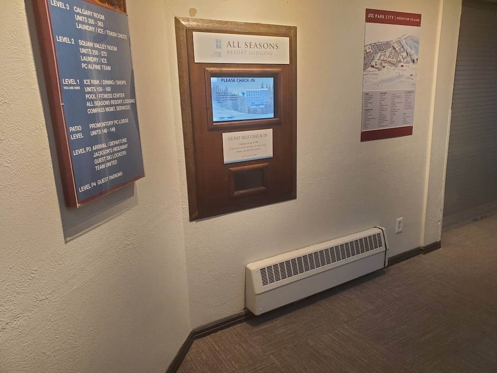Check-in/check-out kiosk