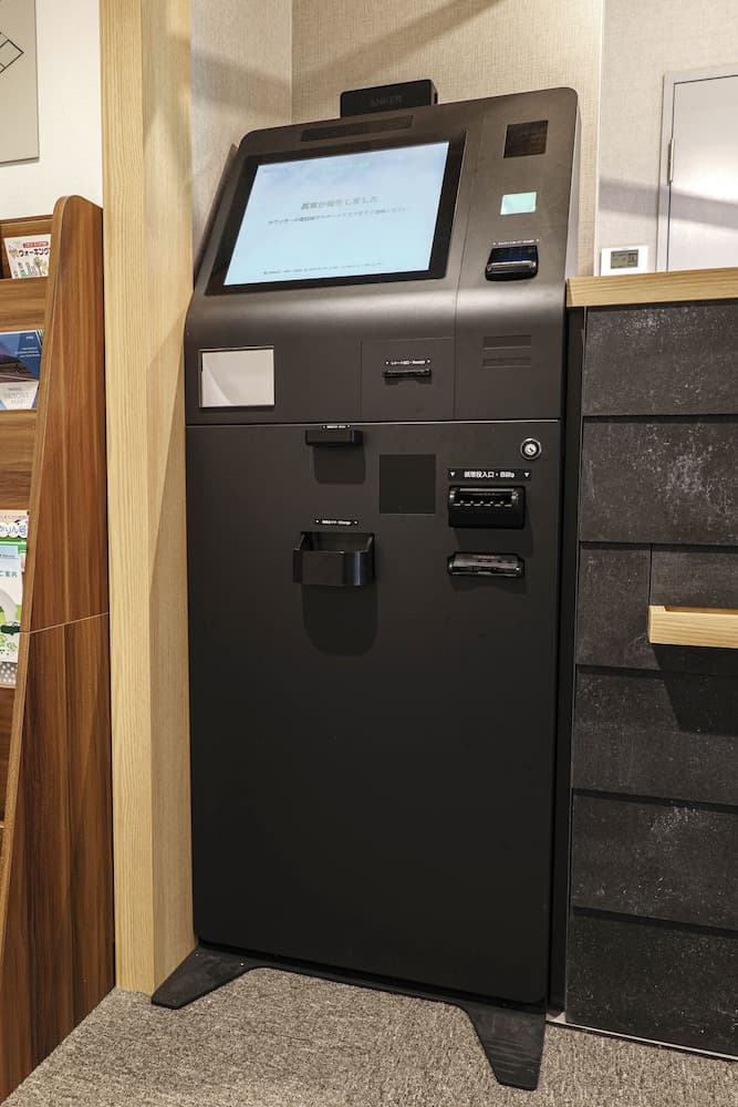 Check-in/check-out kiosk